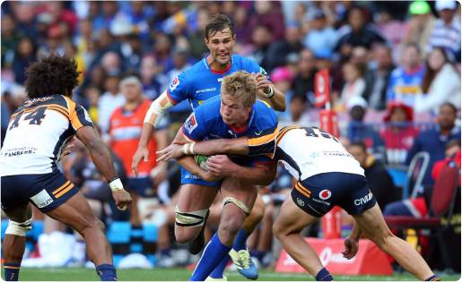 Evan Roos breaks a tackle